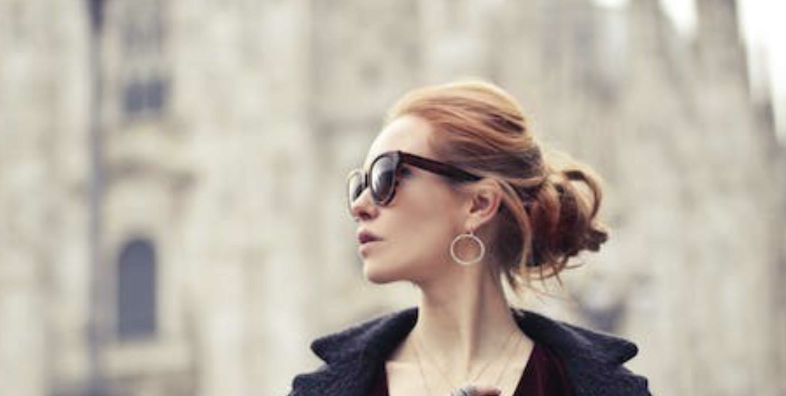 Lady in Paris, wearing sunglasses