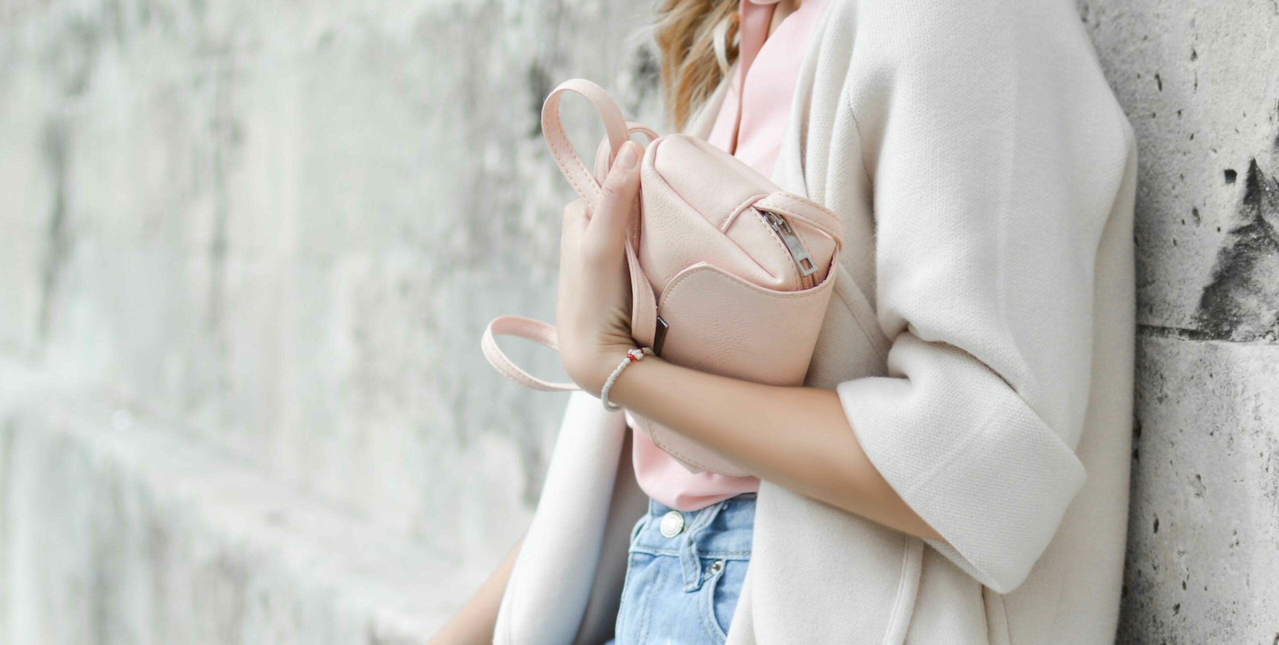 Lady holding pink handbag